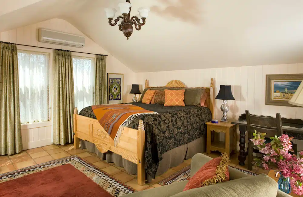 After exploring the top Santa Fe hiking trails this fall, unwind at our top-rated Bed and Breakfast in Santa Fe with gorgeous guest rooms like this